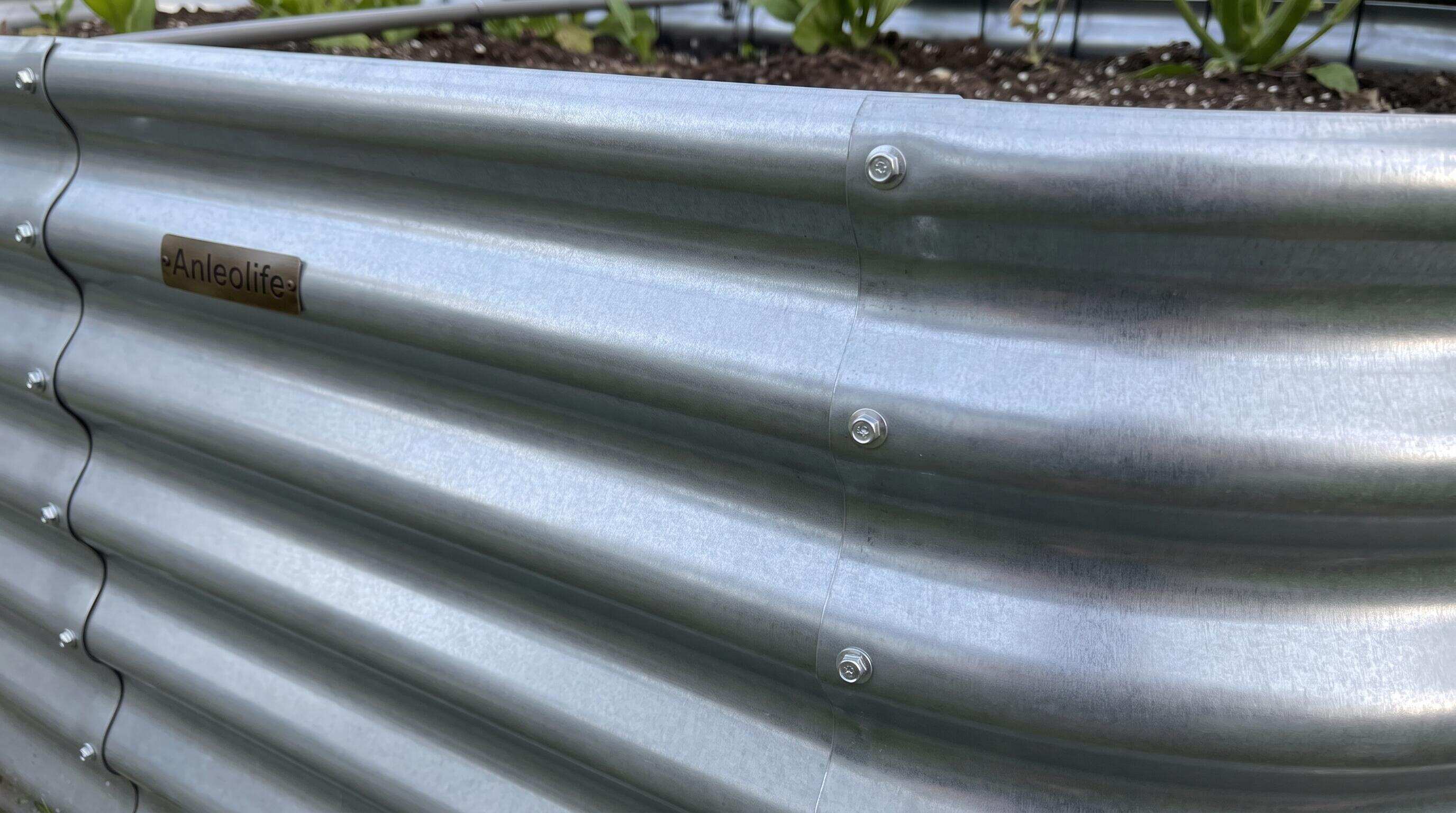 Galvanized raised garden bed showing seasonal care with soil system and rust-resistant steel panels Galvanized raised garden bed showing seasonal care with soil system and rust-resistant steel panels